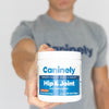 Person holding a Caninely Hip & Joint supplement container with a gray t-shirt in the background